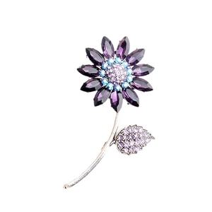 Exquisite flower brooch with purple crystal petals and rhinestone-encrusted silver leaf