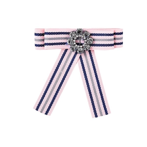 Elegant light pink ribbon bow brooch with navy stripes and a sparkling crystal center