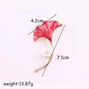 Red enamel ginkgo leaf brooch with pearls and gold finish, sized 7.1cm by 4.2cm