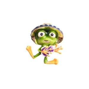 Whimsical green frog enamel pin brooch with blue hat and purple flower on white background
