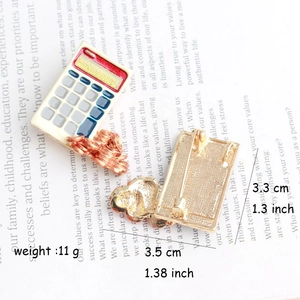 Detailed view of creative calculator brooch set with size dimensions and metal pin back