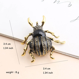 Creative beetle beetle brooch with black enamel and grey rhinestones on gold metal base