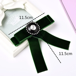 Elegant green velvet bow brooch with crystal embellishment and center stone decoration