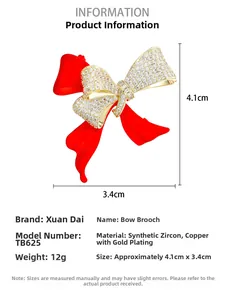 Detailed size chart of red bow brooch with 12g weight and 4.1cm x 3.4cm dimensions