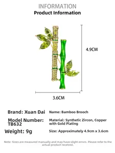 Detail showing green bamboo brooch dimensions 4.9cm by 3.6cm with gold plating