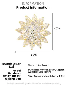 Close-up of sparkling 4.0cm lotus brooch with cubic zirconia and gold plating