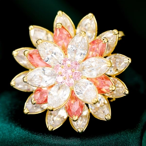 Luxury three-tier snow lotus brooch with marquise-cut zircons on a gold metal base