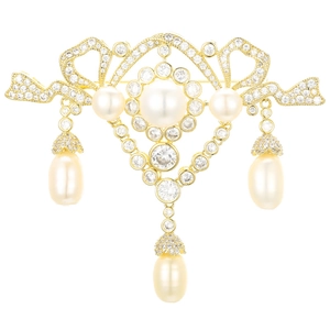 Elegant gold brooch with zircon accents and pearl tassels in a vintage Victorian style