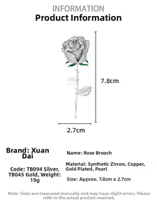 Detailed view of rose brooch with cubic zirconia petals and green enamel leaf