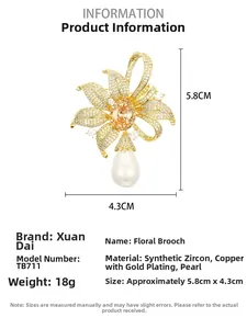 Détails d'une broche fleur plaquée or avec zircons, dimensions et poids du bijou