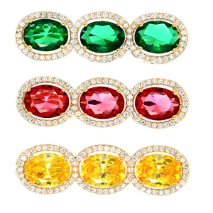 Three-piece oval zircon brooch set with micro-pave crystals in green, red, and yellow colors