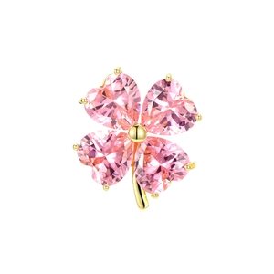 Detailed view of pink heart-shaped crystal clover brooch with gold plating and fine cut