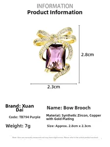 Detail view of purple bow brooch showing 2.8cm height and 2.3cm width dimensions