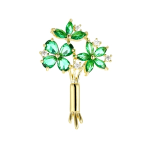 Élégante broche bouquet de fleurs dorée avec pétales en pierres vertes et cristaux brillants