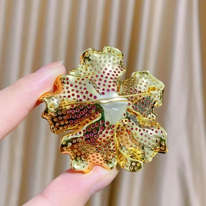 Detailed back view of a luxury peony brooch with secure pin clasp and gold metal base