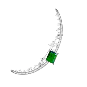 Elegant silver crescent moon brooch with pavé zircon and emerald green centerpiece stone