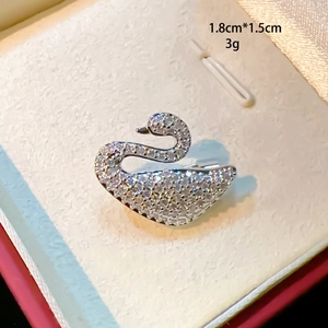 Detailed swan brooch dimensions of 1.8cm by 1.5cm with silver-tone crystal setting