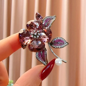 Elegant purple crystal flower brooch with white freshwater pearl in silver-tone setting