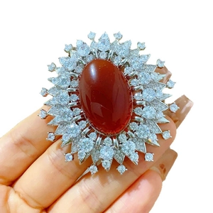 Luxurious palace style oval red agate brooch with sparkling zircon sunflower frame