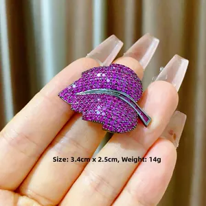 Close-up of purple zircon leaf brooch in black gold finish, size 3.4CM x 2.5CM