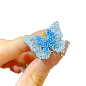 Elegant silver butterfly brooch with blue and white micro-set zircons on double wings