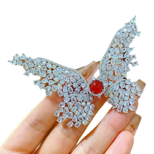 French style silver butterfly brooch with sparkling zircon and central red gemstone