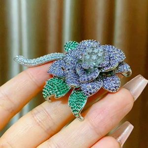 Elegant purple rose brooch with violet zircons and green leaves for evening dresses