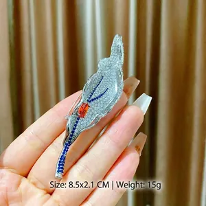Elegant leaf brooch with blue and orange crystals, 8.5cm long, luxury suit accessory