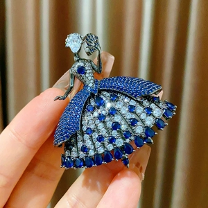 Broche de bailarina de lujo con cristales azul oscuro y blanco en marco de cromo negro