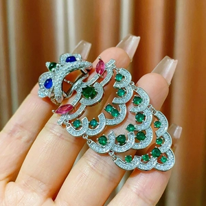 Exquisite Chinese lion dance brooch with vibrant colorful crystals and hanging tassels
