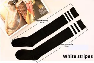 Detail view of black thigh-high socks with white stripes showing 62cm total length