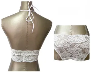 Detailed view of white floral lace lingerie set showing the backless halter top and panties