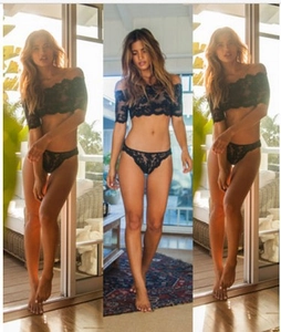 Détail du haut à épaules dénudées en dentelle noire et bikini assorti sur un balcon
