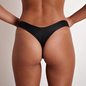 Detailed back view of high-cut black thong with seamless stitching and V-shape design