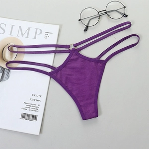 Detail view of purple G-string with double straps and gold metal ring decoration