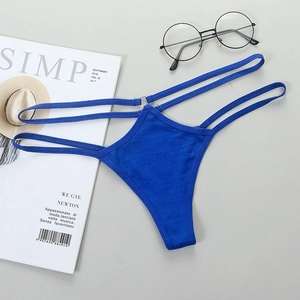 Detail shot of navy blue thong featuring double thin straps and gold metal ring hardware