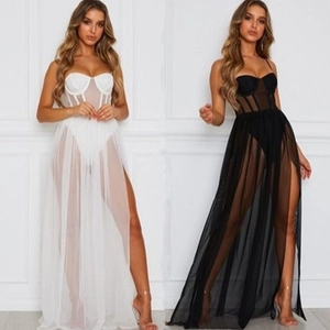Elegant strapless mesh maxi dress with sheer slit skirt and corset bodice in black and white