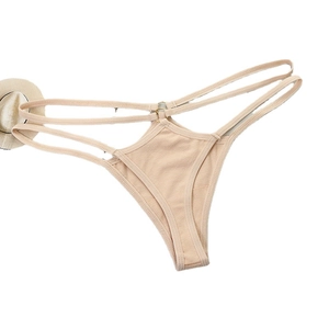 Transparent low-waist thong with multi-strap cutouts and metal rings in beige
