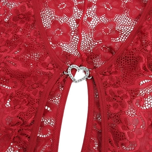 Detail of red floral lace lingerie featuring a crystal-studded silver heart buckle