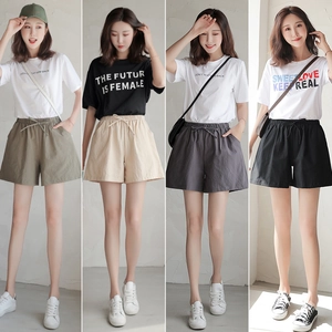 Women's loose drawstring shorts in olive green, beige, dark grey, and black colors
