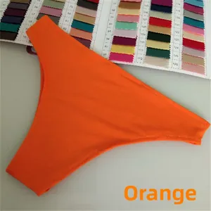 Close-up of orange high-cut bikini bottom showing fine knit texture and stitching