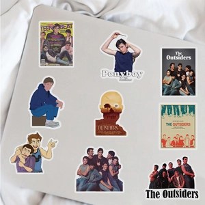 Waterproof The Outsiders themed vinyl stickers applied on a silver laptop surface