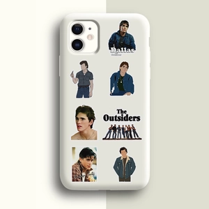 Detail of The Outsiders movie stickers on a phone case featuring character portraits