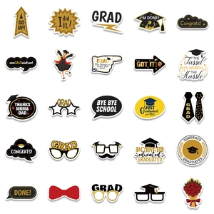 Detailed collection of 25 graduation photo booth props with gold and black cardstock designs