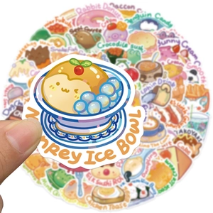 Close-up of waterproof cartoon animal and food stickers with shiny finish