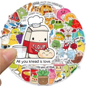 Close-up of waterproof cartoon food stickers with funny puns and motivational phrases