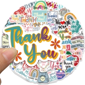 Close-up of colorful waterproof vinyl Thank You stickers for gift and laptop decoration