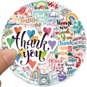 Close-up of colorful waterproof Thank You stickers for gift sealing and laptop decoration