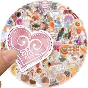 Boho style waterproof sticker featuring a pink heart and dream catcher design detail
