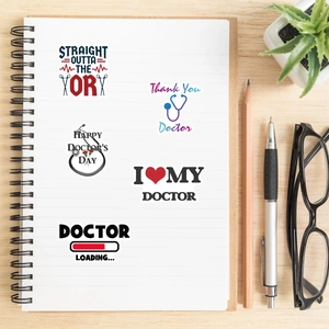 Detail of medical doctor theme stickers on notebook with glasses and pen decoration